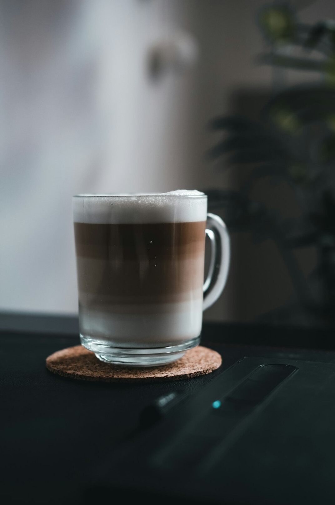 Minimal workspace with laptop and coffee cup